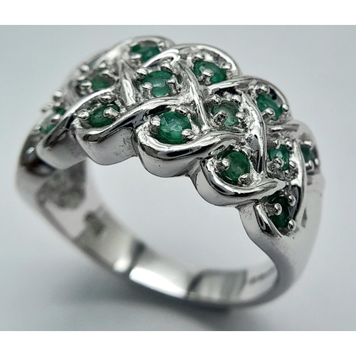 761 - A Hallmarked 2005 Sterling Silver Emerald Set Ring Size R. The Ring Measures 1.2cm Wide at the crown... 