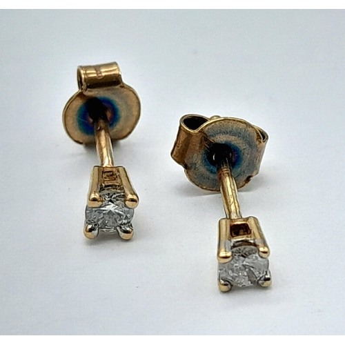 773 - A PAIR OF 9K YELLOW GOLD DIAMOND STUD EARRINGS. 0.7G TOTAL WEIGHT. APPROX. 1.4CM IN LENGTH. Ref: SC ... 