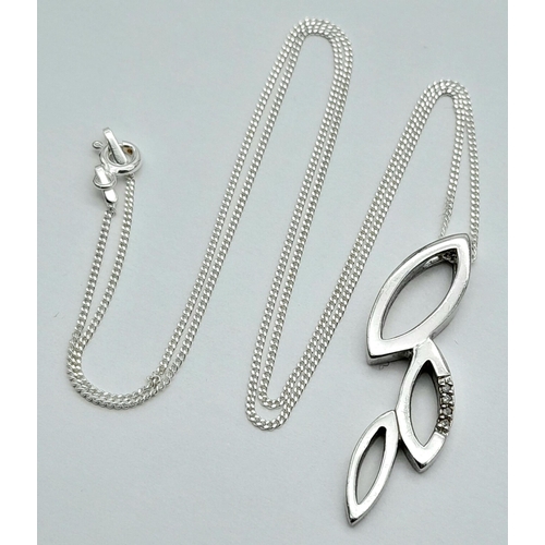 908 - A Sterling Silver Modernist Design Diamond Set Pendant Necklace. 46cm Length. Pendant Measures 3.6cm... 