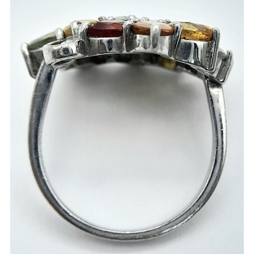 950 - A Sterling Silver Multi-Semi Precious Gemstone Set Ring Size Q. The Ring Measures 2.2cm wide at the ... 