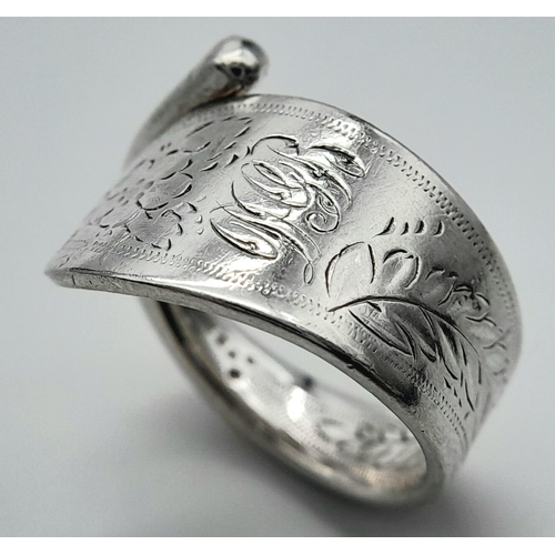 999 - An Antique Hallmarked 1860/1 Silver Flower and Leaf Detailed Ring Size R. The Ring is open shank ove... 