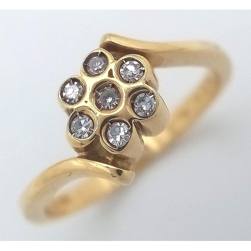 107 - AN 18K YELLOW GOLD DIAMOND TWIST CLUSTER RING. 3.65G IN WEIGHT. SIZE N. Ref: A/S 1194