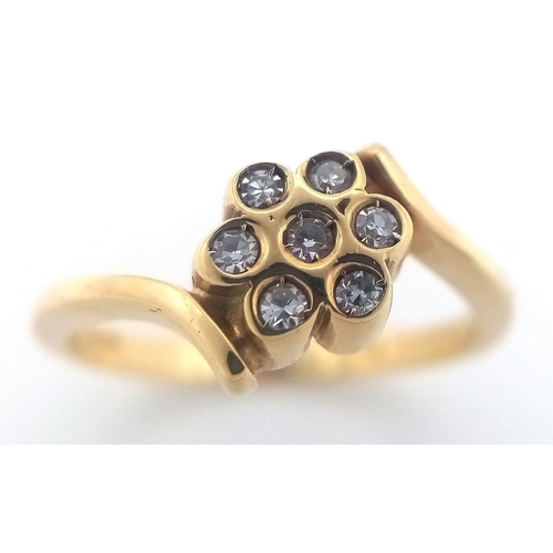 107 - AN 18K YELLOW GOLD DIAMOND TWIST CLUSTER RING. 3.65G IN WEIGHT. SIZE N. Ref: A/S 1194