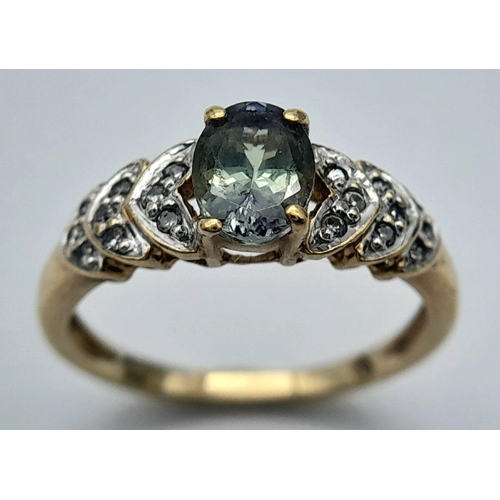 112 - Impressive 18 CARAT GOLD, AQUAMARINE and DIAMOND RING. Having three steps of DIAMONDS  to both Shoul... 