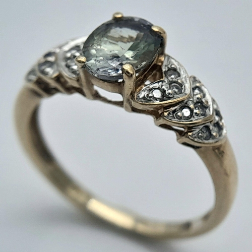 112 - Impressive 18 CARAT GOLD, AQUAMARINE and DIAMOND RING. Having three steps of DIAMONDS  to both Shoul... 