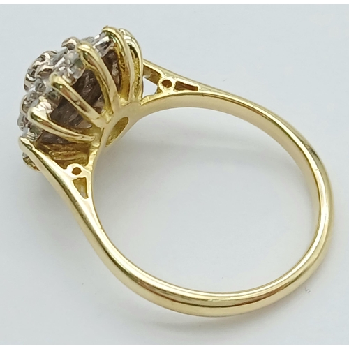 142 - AN 18K YELLOW GOLD DIAMOND CLUSTER RING 0.65CT. 4.7G IN WEIGHT. SIZE L AND 1/2. Ref: SC 1049