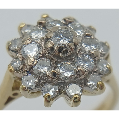 142 - AN 18K YELLOW GOLD DIAMOND CLUSTER RING 0.65CT. 4.7G IN WEIGHT. SIZE L AND 1/2. Ref: SC 1049