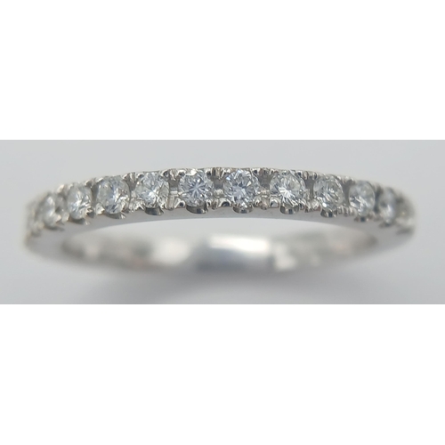 149 - AN 18K WHITE GOLD DIAMOND 1/2 ET RING. 0.35CT. 2.85G IN WEIGHT. SIZE L. Ref: SC 1055