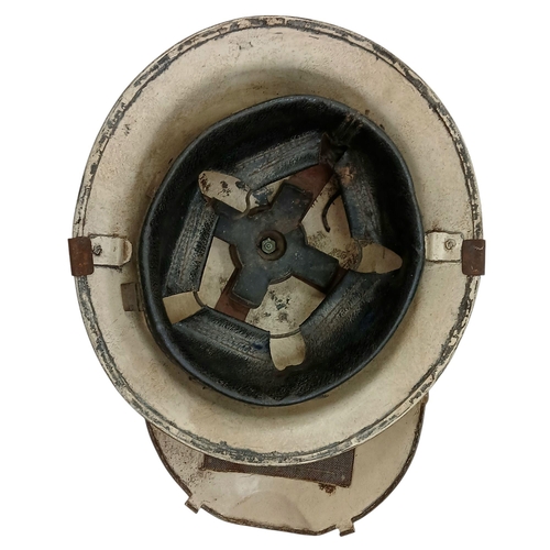 162 - A WW2 British Home Front Fire Guards Helmet with a private purchase “Quick Action” Visor attachment.