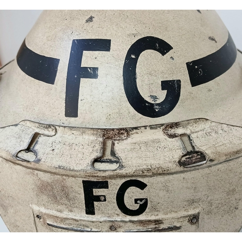 162 - A WW2 British Home Front Fire Guards Helmet with a private purchase “Quick Action” Visor attachment.