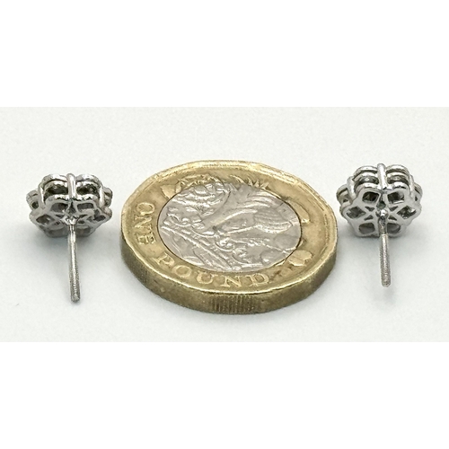 177 - A PAIR OF 18K WHITE GOLD DIAMOND STUD EARRINGS. 2.45G TOTAL WEIGHT. WITH SCREW BACK FITTINGS . Ref: ... 