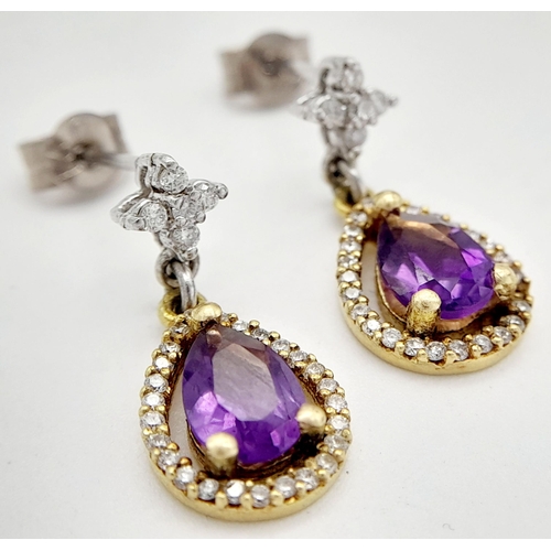 191 - A PAIR OF 18K 2 COLOUR GOLD DIAMOND & AMETHYST DROP EARRINGS. 2.85G TOTAL WEIGHT. 1.10CT. APPROX. 1.... 