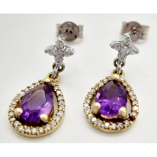 191 - A PAIR OF 18K 2 COLOUR GOLD DIAMOND & AMETHYST DROP EARRINGS. 2.85G TOTAL WEIGHT. 1.10CT. APPROX. 1.... 