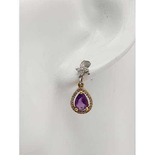 191 - A PAIR OF 18K 2 COLOUR GOLD DIAMOND & AMETHYST DROP EARRINGS. 2.85G TOTAL WEIGHT. 1.10CT. APPROX. 1.... 