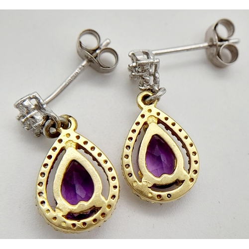 191 - A PAIR OF 18K 2 COLOUR GOLD DIAMOND & AMETHYST DROP EARRINGS. 2.85G TOTAL WEIGHT. 1.10CT. APPROX. 1.... 