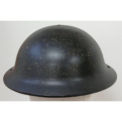 204 - A WW2 British Homefront Plasfort Fibre Lightweight Helmet. Supplied by the hatters Dunn & Co. Worn b... 