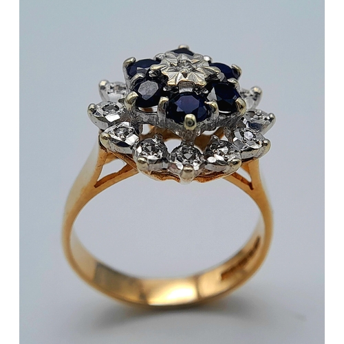 212 - A 9K YELLOW GOLD DIAMOND & SAPPHIRE CLUSTER RING. 4.55G IN WEIGHT. SIZE N. Ref: SC 1004