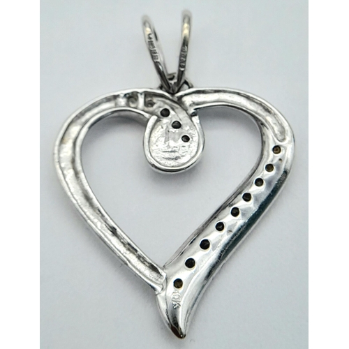 231 - Beautiful  9 CARAT WHITE GOLD and DIAMOND PENDANT. Heart shaped and set with 14 Sparkling DIAMONDS .... 