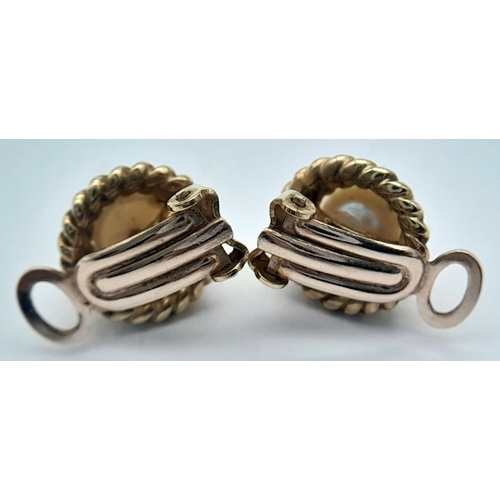 252 - Impressive pair of elegant 9 CARAT GOLD CLIP-ON EARRINGS. Having the form of coiled rope with pearl ... 