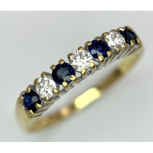 261 - AN 18K YELLOW GOLD DIAMOND & SAPPHIRE BAND RING 0.21CT. 2.2G IN WEIGHT. SIZE P. Ref: SC 1048