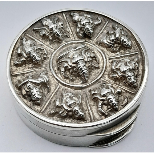 280 - Rare Eastern Vintage SILVER SNUFF BOX. Circular form with raised DEITIES. 4.5 cm.