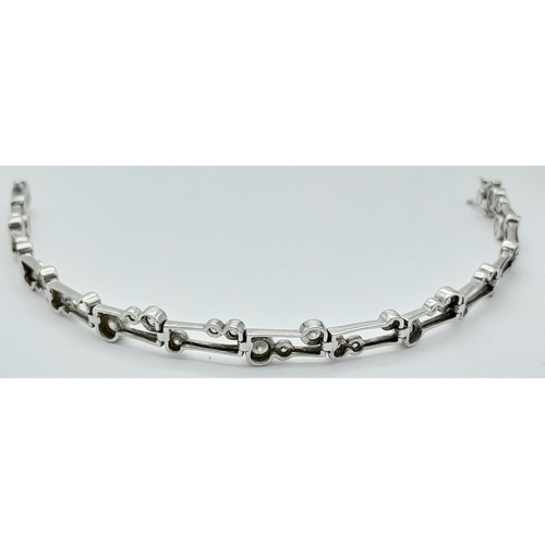 287 - Beautiful SILVER TENNIS BRACELET tramline set with Round Cut ZIRCONIA GEMSTONES.19 cm.