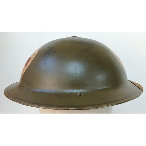 325 - An Early War British Mk II Medics Helmet. 1939 Dated. Maker Marked: WD = William Dodson & Sons of Bi... 