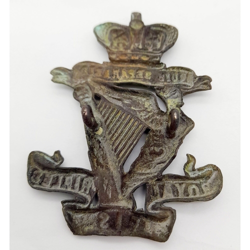 351 - A Boer War Period Royal Irish Rifles Glengarry Badge with Queen Victoria Crown. The badge was found ... 