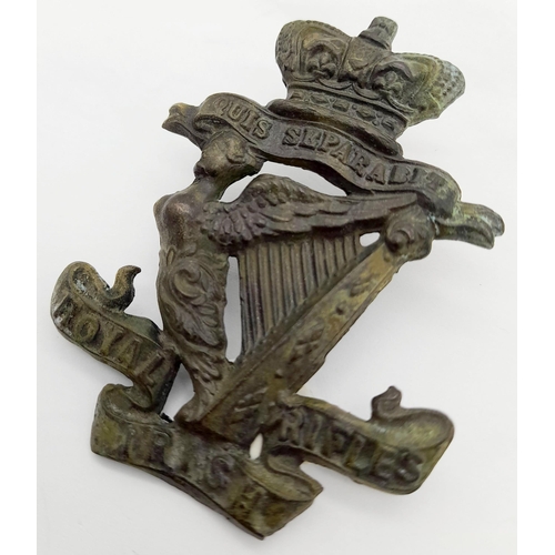 351 - A Boer War Period Royal Irish Rifles Glengarry Badge with Queen Victoria Crown. The badge was found ... 