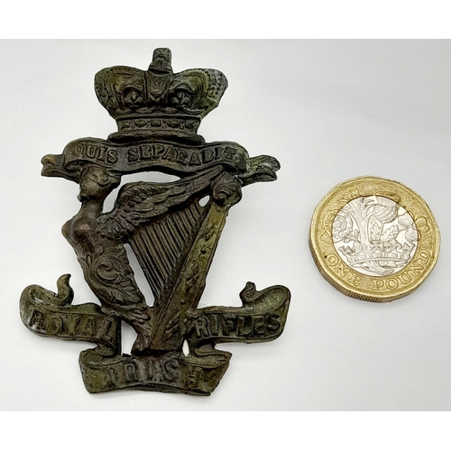 351 - A Boer War Period Royal Irish Rifles Glengarry Badge with Queen Victoria Crown. The badge was found ... 