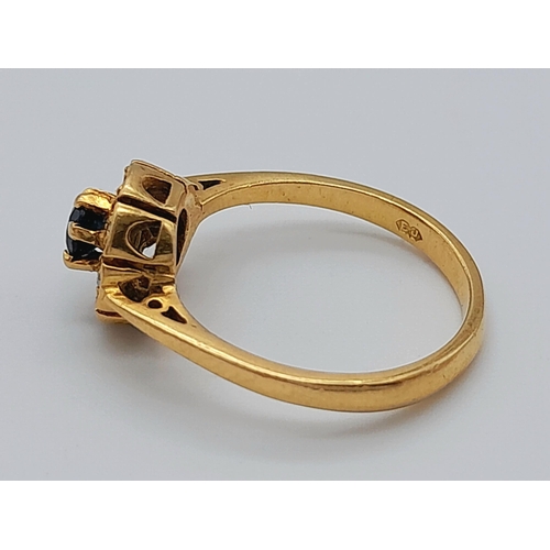 352 - AN 18K YELLOW GOLD DIAMOND & SAPPHIRE RING. 2.48G IN WEIGHT. SIZE G AND 1/2. Ref: SC 1057