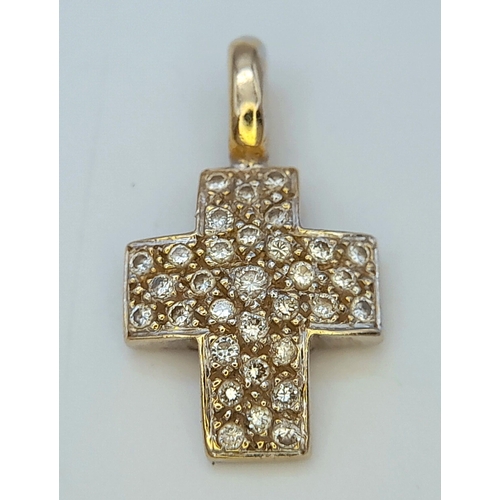 366 - AN 18K WHITE GOLD DIAMOND SET CROSS PENDANT 1.9G IN WEIGHT  APPROX. 1.8CM IN HEIGHT AND 1.1CM IN WID... 