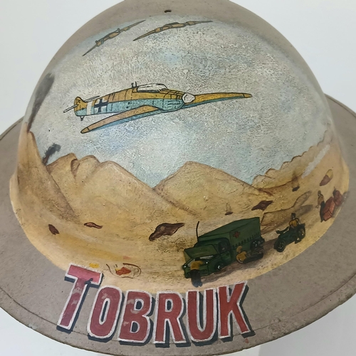 393 - A WW2 British Memorial Helmet with a post War Tribute to “Tobruk”