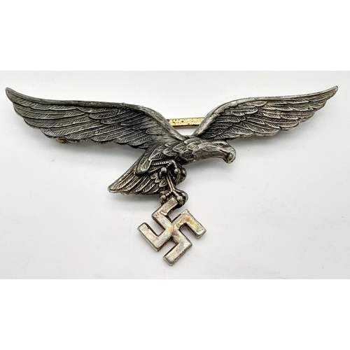 407 - A 3rd Reich Luftwaffe Tropical Whites Breast Eagle. Maker: Assmann.