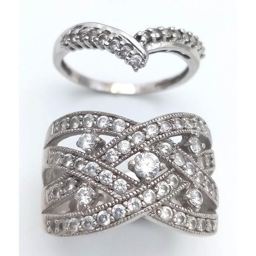 487 - A Parcel of Two Ladies Dress Rings Comprising 1) A 9 Carat White Gold Cubic Zirconia Wishbone Design... 