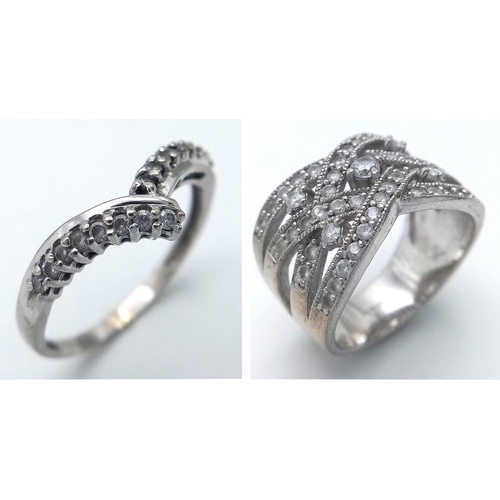 487 - A Parcel of Two Ladies Dress Rings Comprising 1) A 9 Carat White Gold Cubic Zirconia Wishbone Design... 