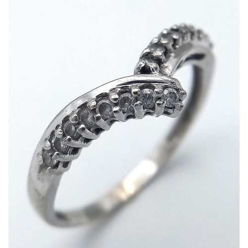 487 - A Parcel of Two Ladies Dress Rings Comprising 1) A 9 Carat White Gold Cubic Zirconia Wishbone Design... 