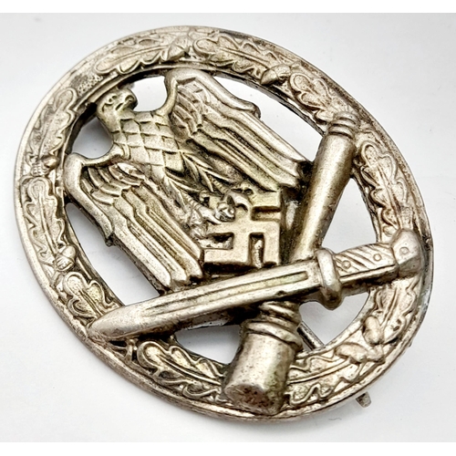 498 - A WW2 German General Assault Badge. Maker Frank & Reif Stuttgart.