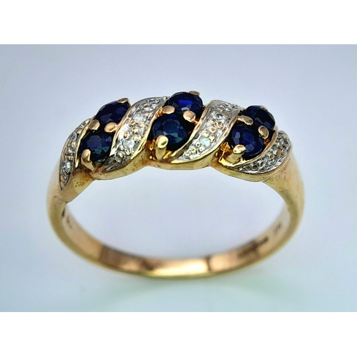 499 - A 9K YELLOW GOLD DIAMOND & SAPPHIRE RING. 2.78G IN WEIGHT. SIZE S AND 1/2. Ref: SC 1008