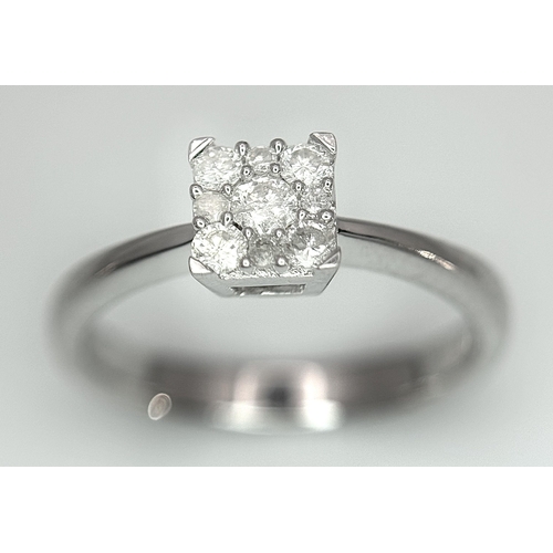 506 - A 9K WHITE GOLD DIAMOND RING 0.15CT. 1.9G IN WEIGHT. SIZE H. Ref: SC 1009