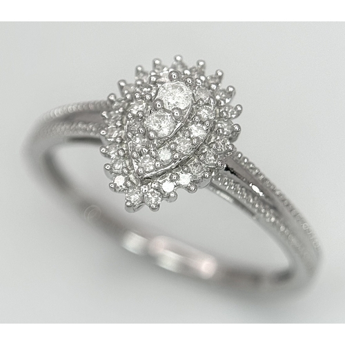 513 - A 9K WHITE GOLD DIAMOND PEAR SHAPE RING 0.16CT. 1.7G TOTAL WEIGHT. SIZE L AND 1/2. Ref: SC 1010