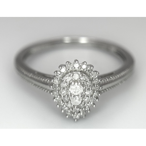 513 - A 9K WHITE GOLD DIAMOND PEAR SHAPE RING 0.16CT. 1.7G TOTAL WEIGHT. SIZE L AND 1/2. Ref: SC 1010