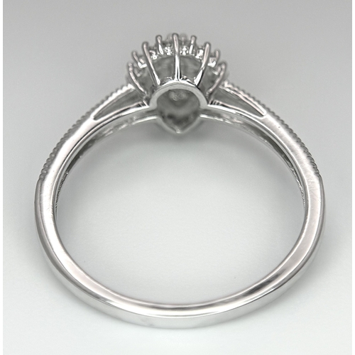 513 - A 9K WHITE GOLD DIAMOND PEAR SHAPE RING 0.16CT. 1.7G TOTAL WEIGHT. SIZE L AND 1/2. Ref: SC 1010