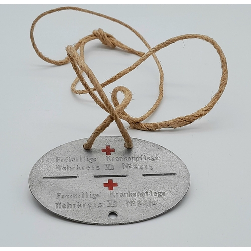 547 - A 3rd Reich DRK (German Red Cross) Nurses Dog Tag.