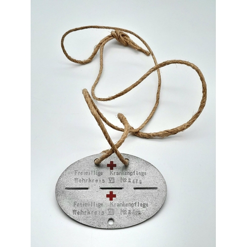 547 - A 3rd Reich DRK (German Red Cross) Nurses Dog Tag.