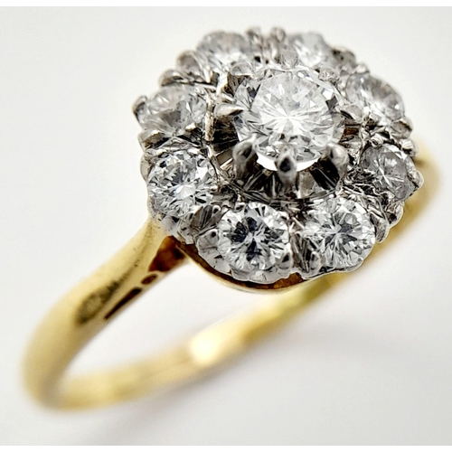 58 - AN 18K YELLOW GOLD & PLATINUM VINTAGE DIAMOND CLUSTER RING. 0.65CT. 3.15G IN WEIGHT. SIZE N. Ref: A/... 