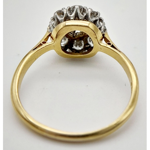 58 - AN 18K YELLOW GOLD & PLATINUM VINTAGE DIAMOND CLUSTER RING. 0.65CT. 3.15G IN WEIGHT. SIZE N. Ref: A/... 