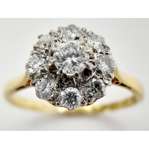 58 - AN 18K YELLOW GOLD & PLATINUM VINTAGE DIAMOND CLUSTER RING. 0.65CT. 3.15G IN WEIGHT. SIZE N. Ref: A/... 