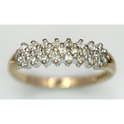 583 - A 9K YELLOW GOLD DIAMOND 3 ROW BAND RING. 1.65G TOTAL WEIGHT. SIZE L AND 1/2. Ref: SC 1036