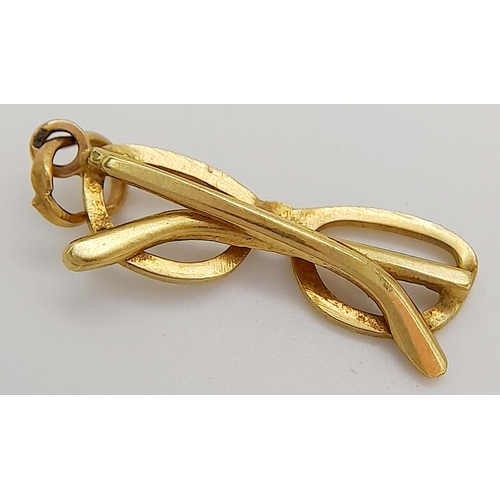 653 - A 9K YELLOW GOLD GALSSES / SPECTACALS CHARM. 1.45G TOTAL WEIGHT. 2.3CM IN LENGTH. Ref: SC 1024